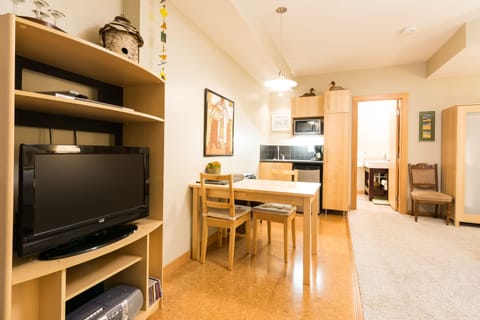 Suite, Partial Lake View | Private kitchenette | Fridge, microwave, coffee/tea maker, electric kettle