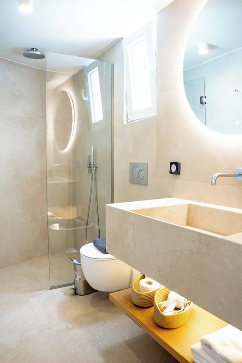 Deluxe Triple Room, Balcony, Sea View | Bathroom | Shower, hair dryer, towels, soap