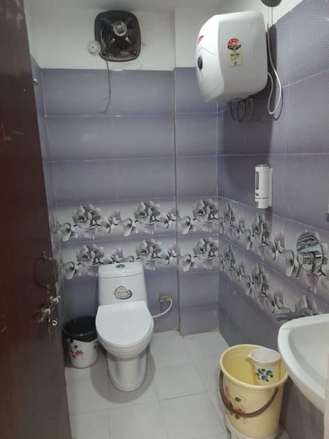 Shower, rainfall showerhead, towels, soap