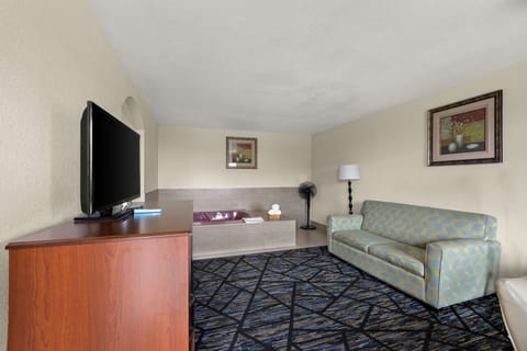 Suite, 1 King Bed, Non Smoking, Jetted Tub | Desk, iron/ironing board, free WiFi, bed sheets