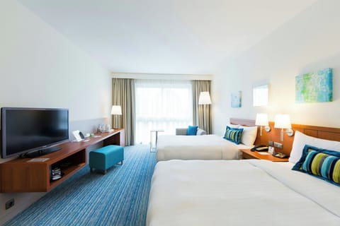 Premium bedding, down comforters, in-room safe, desk