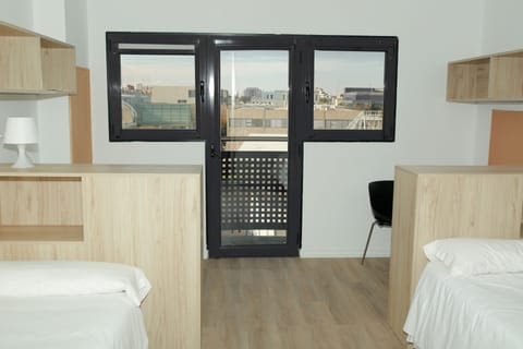 Basic Twin Room | Desk, laptop workspace, blackout drapes, free WiFi