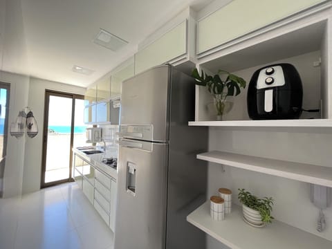 Luxury Apartment, Beach View | Private kitchen | Full-size fridge, oven, stovetop, cookware/dishes/utensils