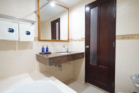 Deluxe Twin Room, Pool Access | Bathroom | Shower, towels, soap, shampoo