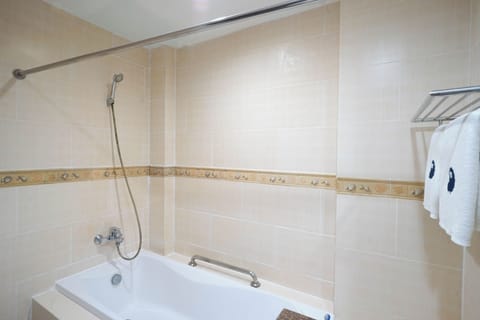 Deluxe Twin Room, Pool Access | Bathroom | Shower, towels, soap, shampoo