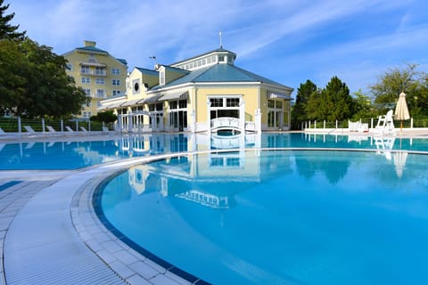 Indoor pool, outdoor pool, open 7 AM to 10 PM, sun loungers