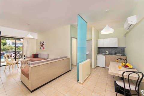 Junior Suite | Living room | 30-inch TV with satellite channels