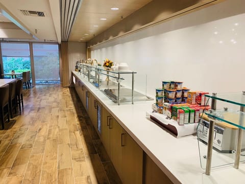 Daily buffet breakfast (USD 17 per person)