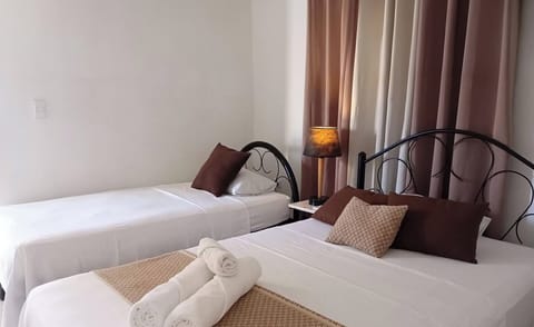 Comfort Apartment, Balcony, City View | Blackout drapes, iron/ironing board, WiFi, bed sheets