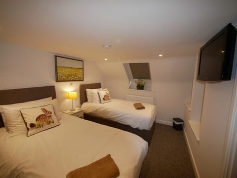 Superior Triple Room, Sea View | In-room safe, iron/ironing board, free WiFi, bed sheets