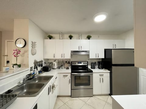 Apartment, 2 Bedrooms, Resort View | Private kitchen | Coffee/tea maker, dining tables