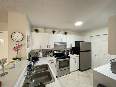 Apartment, 2 Bedrooms, Resort View | Private kitchen | Coffee/tea maker, dining tables