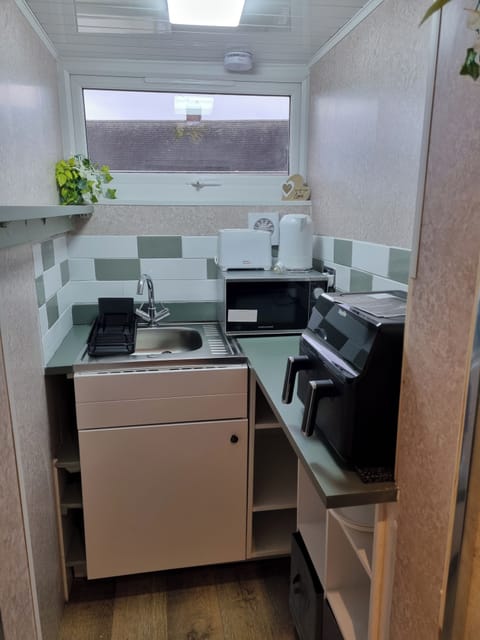 Fridge, microwave, electric kettle, toaster