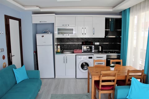 Economy Apartment, Balcony, Garden View | Private kitchen | Full-size fridge, microwave, oven, stovetop