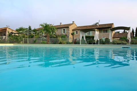 Seasonal outdoor pool, pool umbrellas, sun loungers