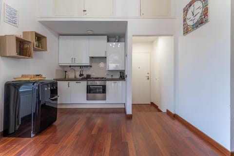 Apartment, Balcony, City View | Private kitchen | Fridge, oven, stovetop, dishwasher