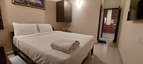 Standard Double Room, Pool View | Premium bedding, in-room safe, desk, iron/ironing board