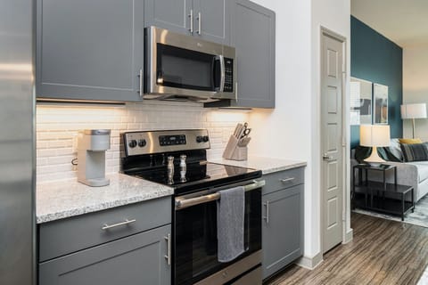 Studio | Private kitchen | Full-size fridge, microwave, oven, stovetop