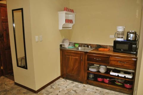 Villa | Private kitchen | Full-size fridge, coffee/tea maker