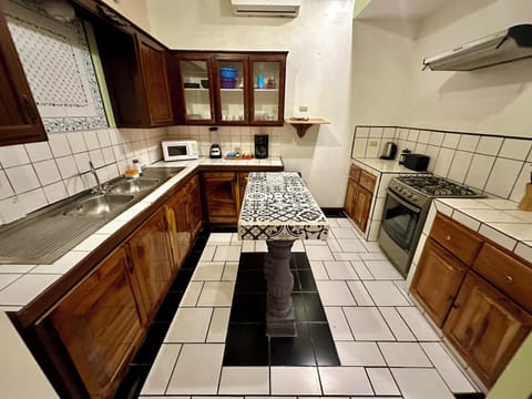 Suite | Private kitchen | Full-size fridge, coffee/tea maker