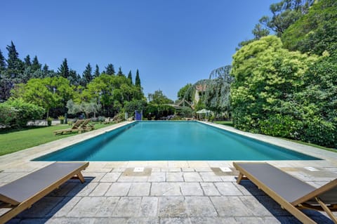 Outdoor pool, pool umbrellas, sun loungers