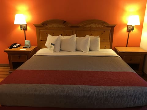 Deluxe Room, 1 King Bed, Non Smoking, Refrigerator & Microwave | Desk, free WiFi, bed sheets