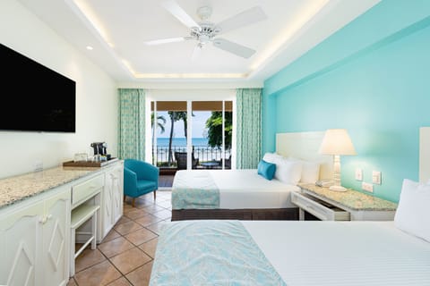 Sunset Ocean View Queen Beds | Premium bedding, minibar, in-room safe, individually decorated