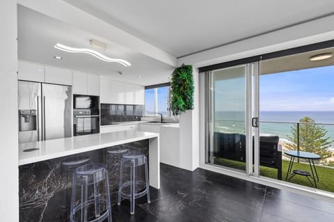 Two-Bedroom Apartment with Ocean View | Private kitchen | Full-size fridge, microwave, oven, stovetop