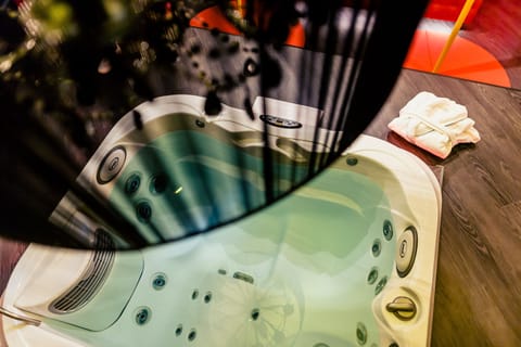 Luxury Studio Suite, 1 King Bed (Direct access) | Bathroom | Shower, free toiletries, hair dryer, bidet