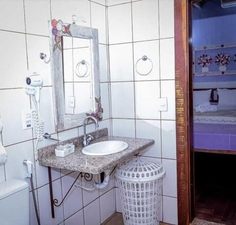 Standard Quadruple Room, Garden View | Bathroom | Shower, free toiletries, hair dryer, towels