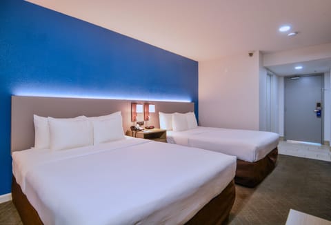 Standard Room, 2 Queen Beds, Non Smoking | Desk, laptop workspace, blackout drapes, iron/ironing board