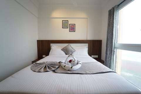 Deluxe Studio Suite, City View | Iron/ironing board, free WiFi, bed sheets