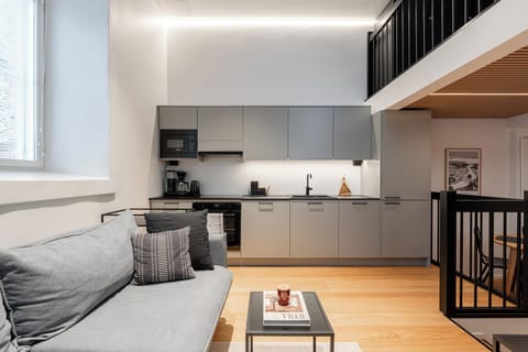 Comfort Apartment | Living area | 42-inch LED TV with cable channels