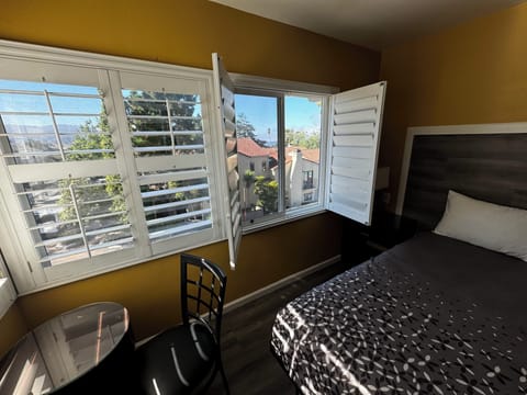 Double Queen Bedroom with Fireplace: Partial Ocean View | Beach/ocean view