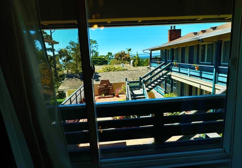 King Bedroom with Fireplace: Partial Ocean View | Beach/ocean view