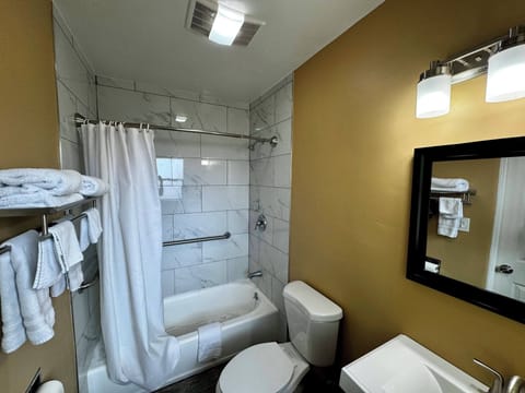 King Bedroom: Full Ocean View | Bathroom | Combined shower/tub, hair dryer, towels, soap