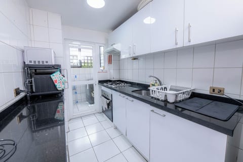 Family Apartment, Balcony, Courtyard View | Private kitchen | Microwave, oven, cookware/dishes/utensils