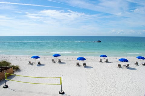 On the beach, sun loungers, beach umbrellas, beach towels