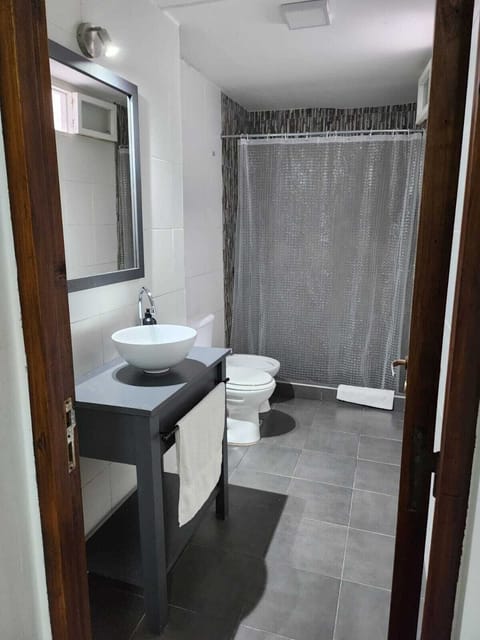 Triple Room, Patio | Bathroom | Shower, hair dryer, towels, soap