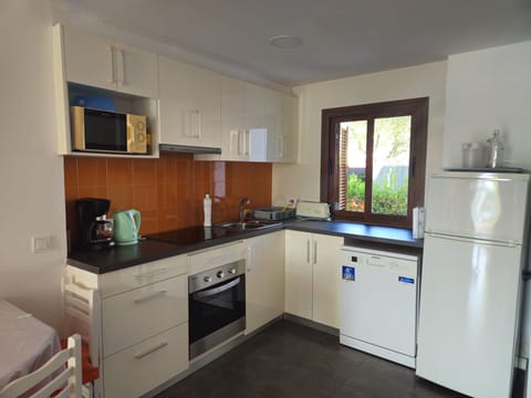 Family Apartment, Poolside | Private kitchen | Full-size fridge, microwave, oven, stovetop