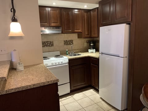 Condo, 2 Bedrooms (205) | Private kitchenette | Fridge, microwave, stovetop, coffee/tea maker