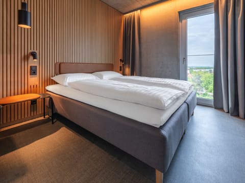 Desk, blackout drapes, soundproofing, bed sheets