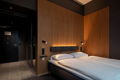 Desk, blackout drapes, soundproofing, bed sheets