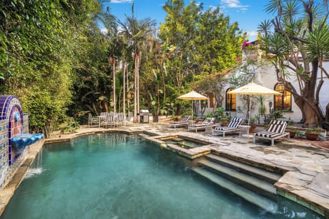 Outdoor pool, pool umbrellas, sun loungers