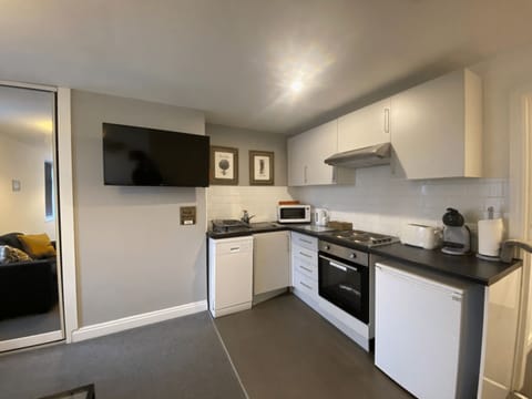 Family Apartment, 1 Bedroom | Desk, laptop workspace, iron/ironing board, free WiFi