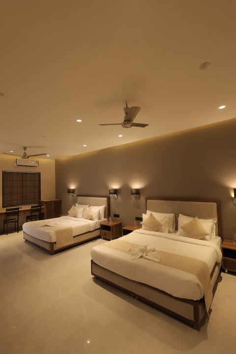 Family Room, Garden View | Individually furnished, desk, laptop workspace, blackout drapes