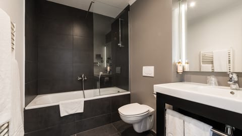 Shower, rainfall showerhead, designer toiletries, hair dryer