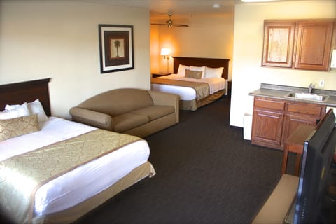 Family Room, Multiple Beds | In-room safe, desk, iron/ironing board, free WiFi