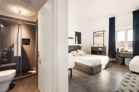 Quadruple Room, Private Bathroom, City View | In-room safe, blackout drapes, soundproofing, iron/ironing board