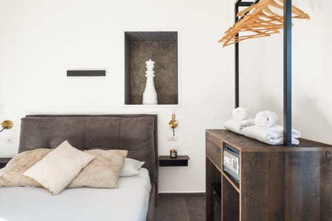 Quadruple Room, Private Bathroom, City View | In-room safe, blackout drapes, soundproofing, iron/ironing board